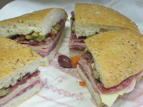 centralmuff Central Grocery Muffuletta with their addictive olive salad