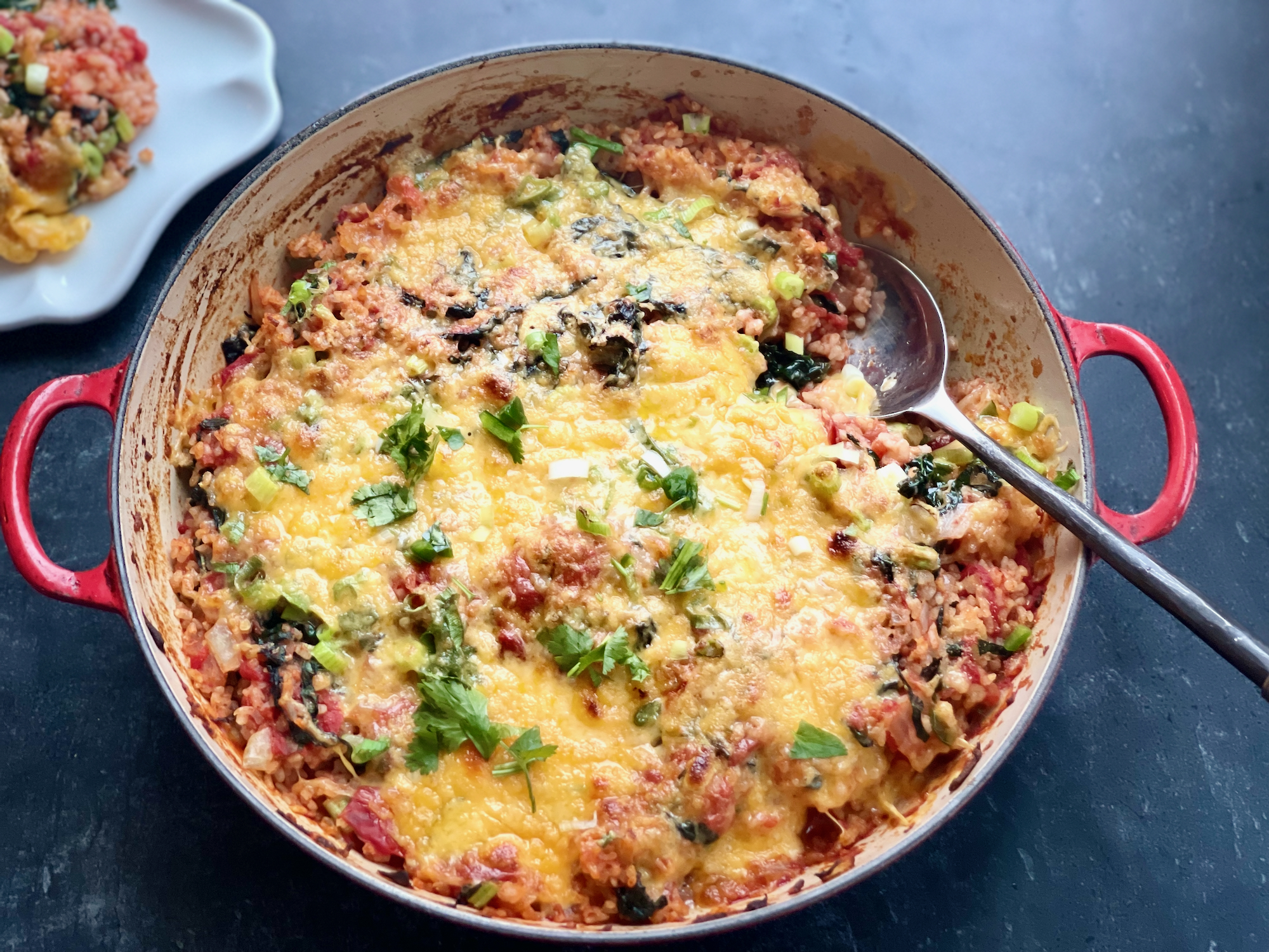 Featured image for “Kale Tomato Rice with Broiled Cheese”